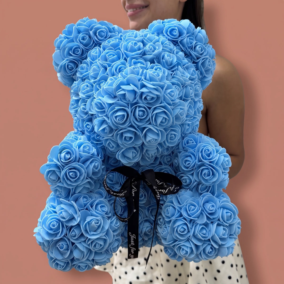 Ours en fleurs, bleu, vu de trois quarts